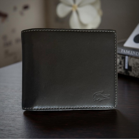 Lacoste Other - Lacoste Leather compact men's smooth kip leather crocodile logo.